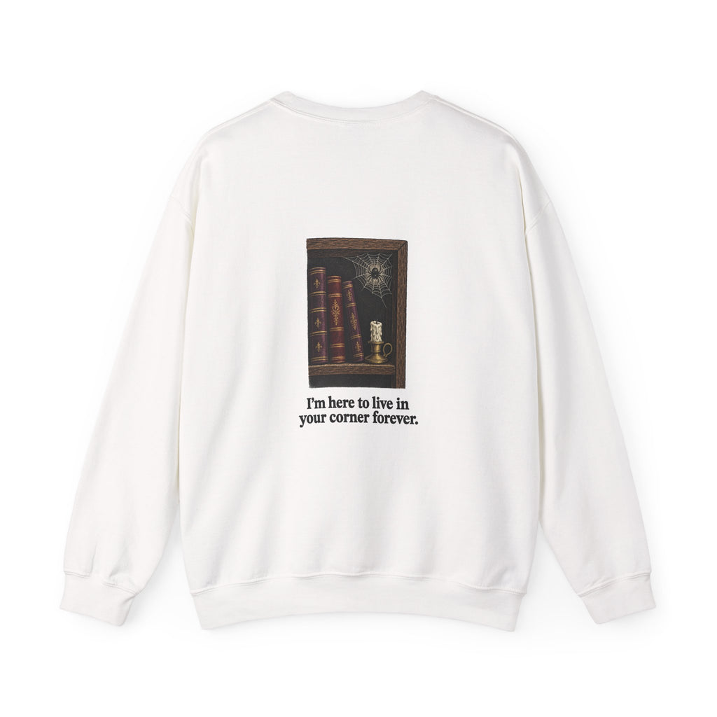 Back of the White I'm Not Here to Socialize spider sweatshirt showing a spider in a bookshelf corner and “I'm here to live in your corner forever.”