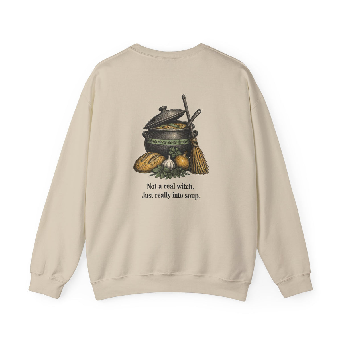 Back of the Sand Kitchen Witch sweatshirt showing a soup pot and broom and “Not a real witch. Just really into soup.”
