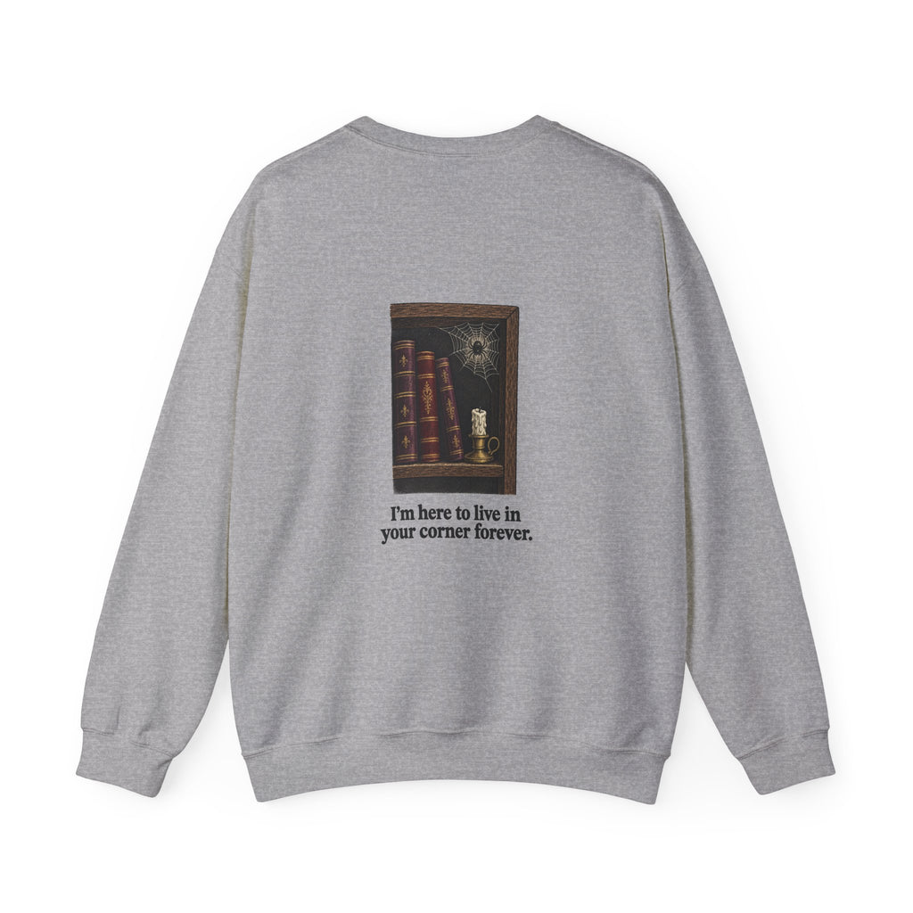 Back of the Sport Grey I'm Not Here to Socialize spider sweatshirt showing a spider in a bookshelf corner and “I'm here to live in your corner forever.”