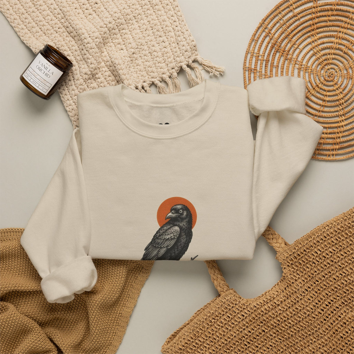 Model wearing the Sand Proud Member of a Murder crow sweatshirt, two-sided crewneck by Kindred Oddities